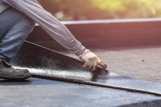 Professional Waterproofing technician working in Cambria, WI